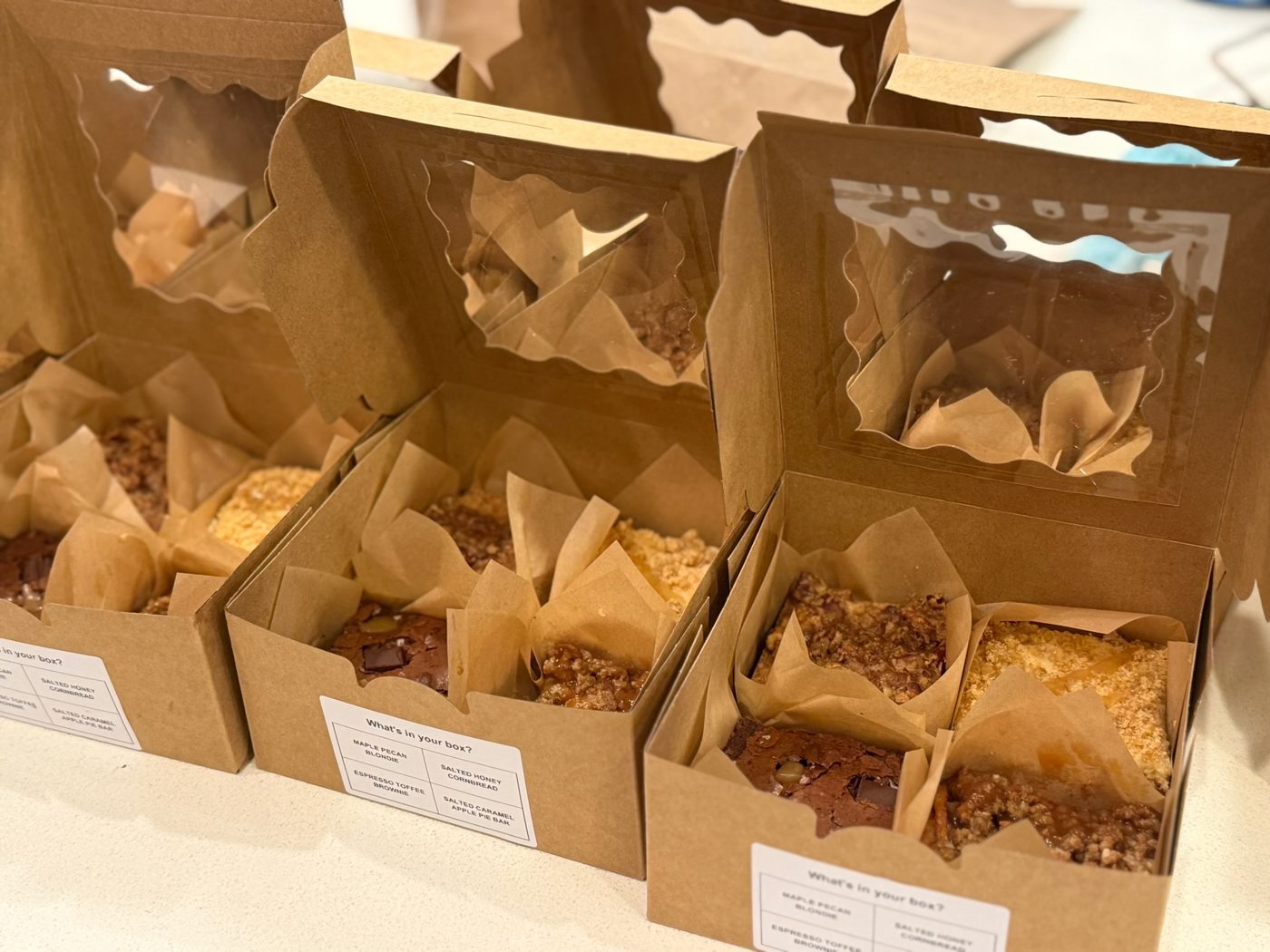 Kraft window boxes packed with four bars each